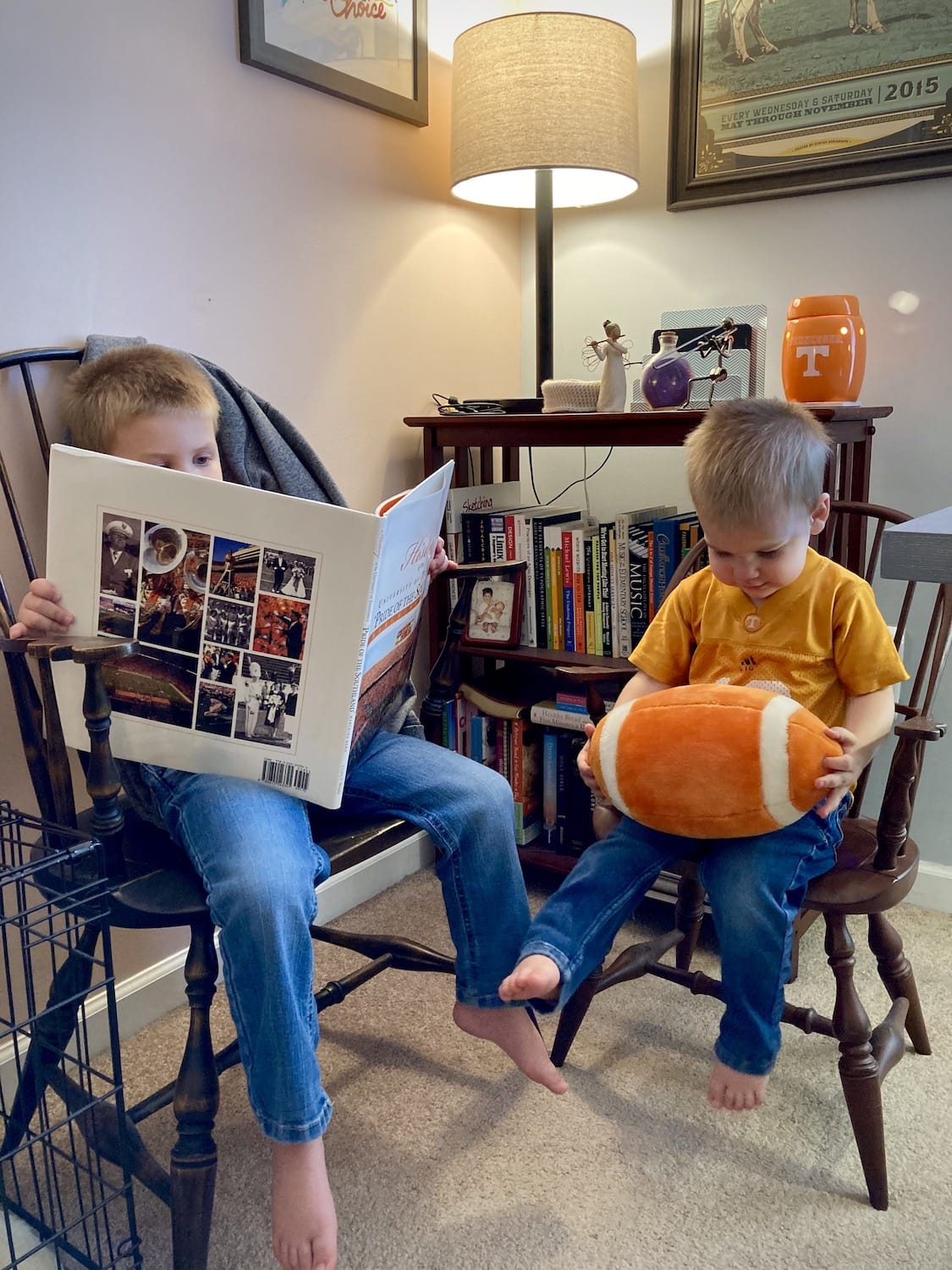 Owen and Arlo, decked out in their Tennessee Volunteers clothing, enjoying
the reading corner